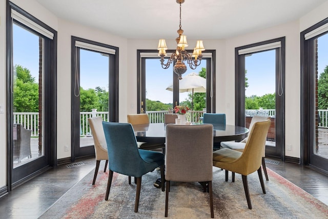 10 Apple Orchard Ct, Dellwood, MN 55110 - dining space featuring a chandelier and wood finished floors