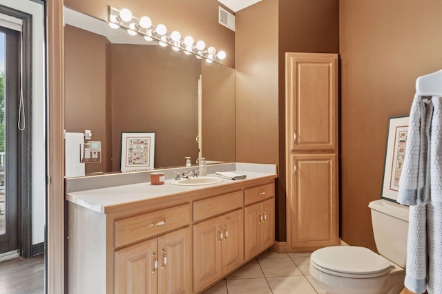 10 Apple Orchard Ct, Dellwood, MN 55110 - bathroom featuring vanity and toilet