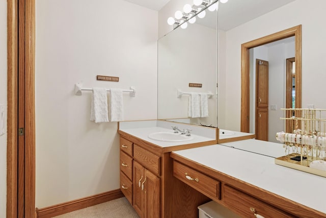 10 Apple Orchard Ct, Dellwood, MN 55110 - bathroom with vanity and baseboards
