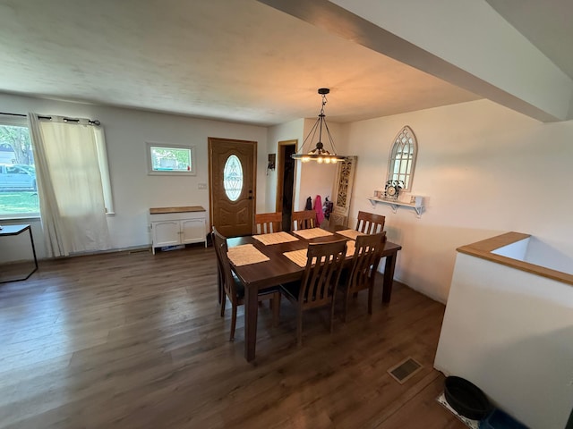 122 3rd St E, Morgan, MN 56266 - dining area featuring dark wood-type flooring