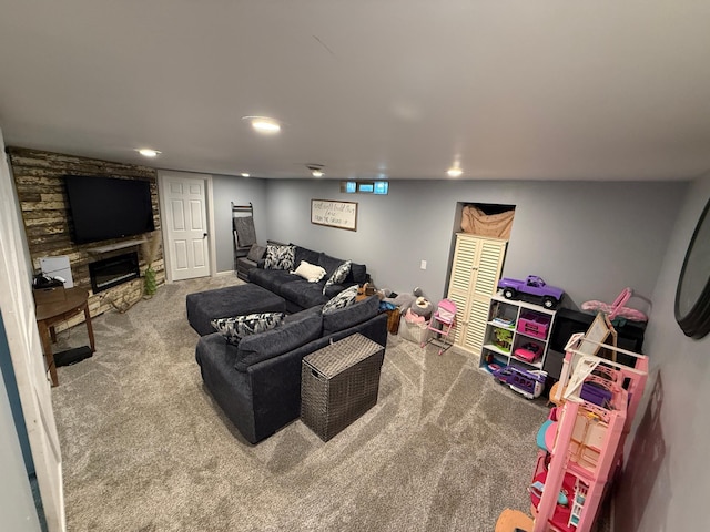 122 3rd St E, Morgan, MN 56266 - living room with carpet floors, a stone fireplace, and recessed lighting