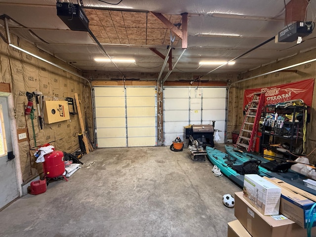 122 3rd St E, Morgan, MN 56266 - garage with a garage door opener