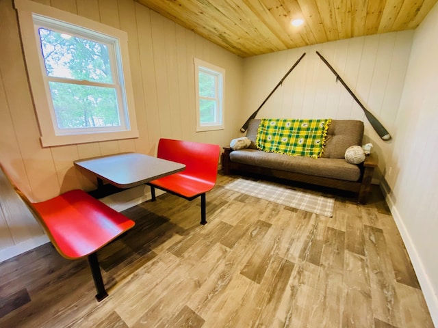W7486 Burval Dr, Minong, WI 54859 - living area with wood finished floors, plenty of natural light, and wood ceiling