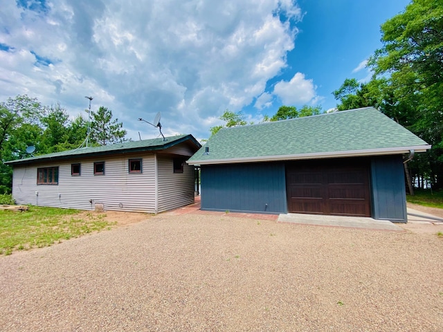 W7486 Burval Dr, Minong, WI 54859 - ranch-style house with an outbuilding and a garage