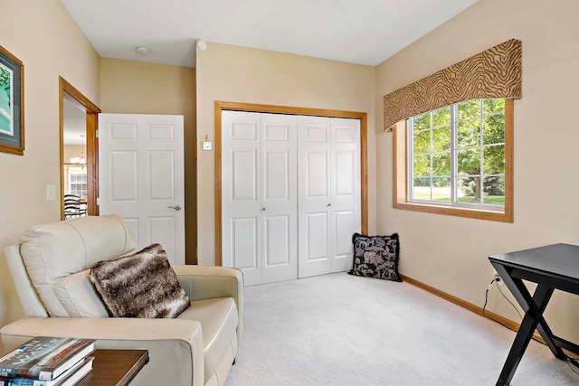 1112 Iris Dr, White Bear Twp, MN 55127 - sitting room featuring carpet floors and baseboards