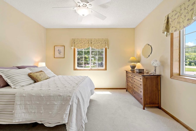 1112 Iris Dr, White Bear Twp, MN 55127 - bedroom featuring light colored carpet and ceiling fan