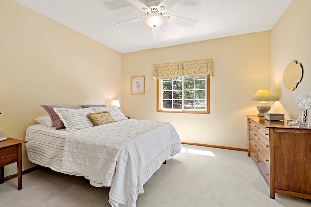 1112 Iris Dr, White Bear Twp, MN 55127 - carpeted bedroom with ceiling fan and a textured ceiling