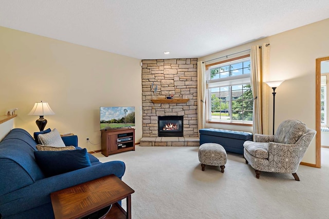 1112 Iris Dr, White Bear Twp, MN 55127 - carpeted living area with a stone fireplace and a textured ceiling