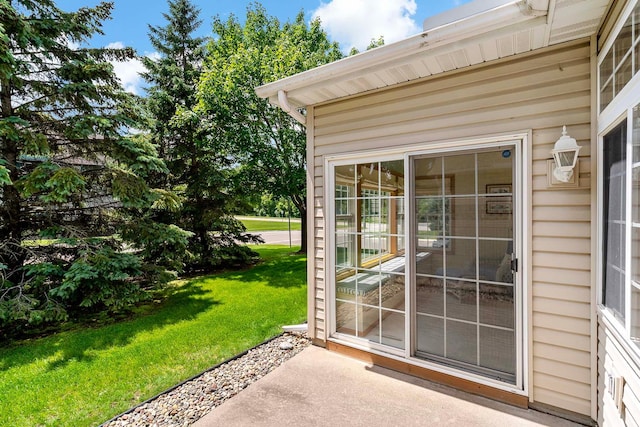 1112 Iris Dr, White Bear Twp, MN 55127 - doorway to property featuring a lawn
