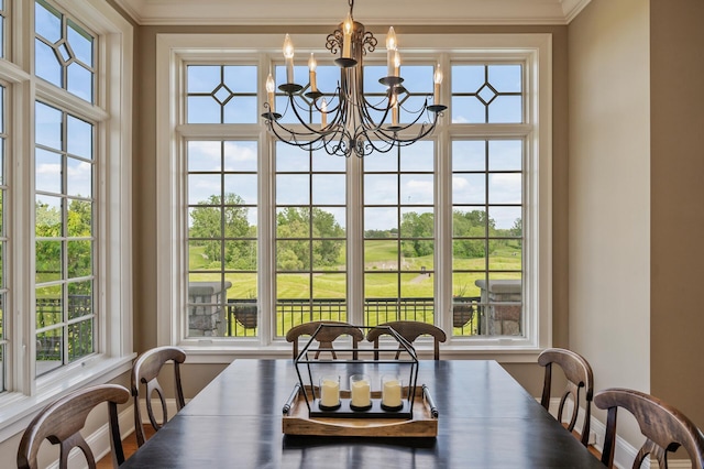 18901 Brookwood Rd, Prior Lake, MN 55372 - dining space featuring crown molding and a chandelier