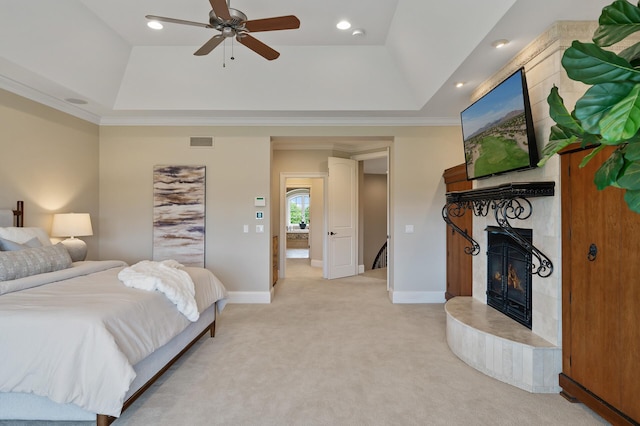 18901 Brookwood Rd, Prior Lake, MN 55372 - bedroom featuring a raised ceiling, a large fireplace, light colored carpet, crown molding, and ceiling fan