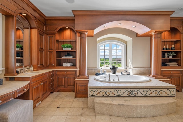 18901 Brookwood Rd, Prior Lake, MN 55372 - full bath featuring decorative columns, a bath, tile patterned flooring, and vanity