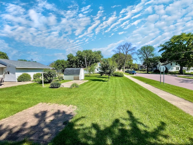 422 Sanborn St, Springfield, MN 56087 - view of grassy yard featuring a storage unit