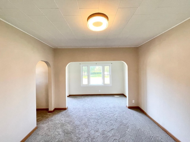 422 Sanborn St, Springfield, MN 56087 - carpeted empty room with arched walkways and crown molding