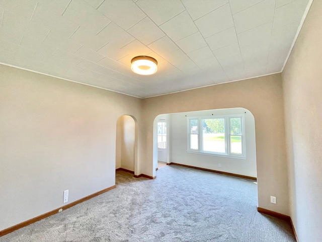 422 Sanborn St, Springfield, MN 56087 - carpeted spare room with arched walkways and baseboards