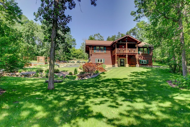28395 Far N Dr, Nevis, MN 56467 - back of property with a lawn and a deck