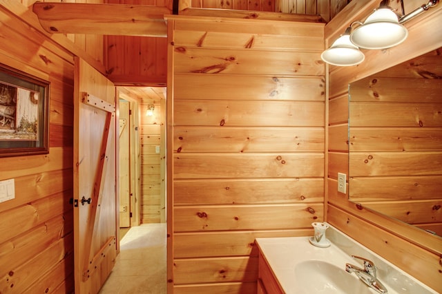 28395 Far N Dr, Nevis, MN 56467 - bathroom with wooden walls, vanity, and tile patterned floors