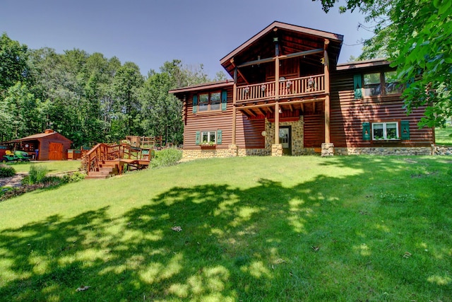 28395 Far N Dr, Nevis, MN 56467 - back of property with a yard and a deck