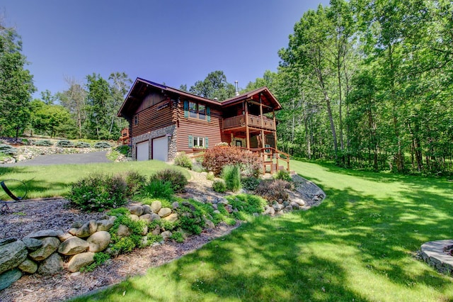 28395 Far N Dr, Nevis, MN 56467 - back of property featuring log exterior, a yard, an attached garage, a balcony, and asphalt driveway