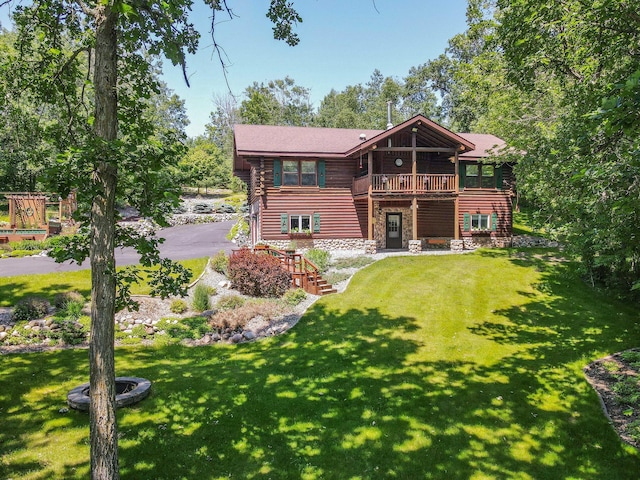 28395 Far N Dr, Nevis, MN 56467 - rear view of house with a lawn, a wooden deck, log siding, and driveway