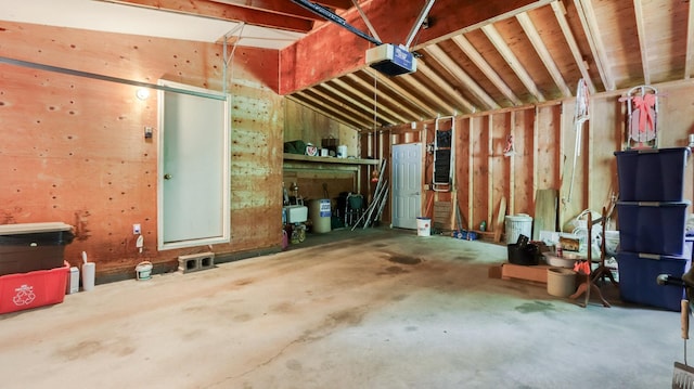 2104 US Highway 8, Stanley Twp, WI 54822 - garage featuring a garage door opener