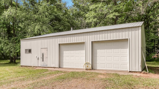 2104 US Highway 8, Stanley Twp, WI 54822 - detached garage with view of scattered trees