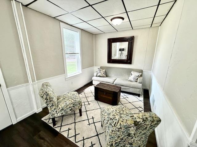 311 Grove St, Redwood Falls, MN 56283 - living area featuring a paneled ceiling and wood finished floors