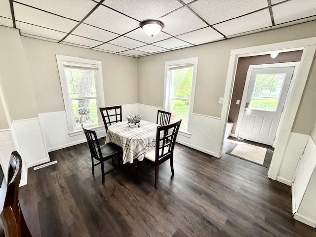 311 Grove St, Redwood Falls, MN 56283 - dining area featuring a paneled ceiling and dark wood-type flooring