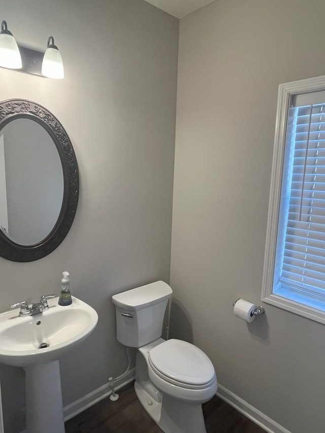 3790 Thrush St, Shakopee, MN 55379 - bathroom featuring wood finished floors and toilet