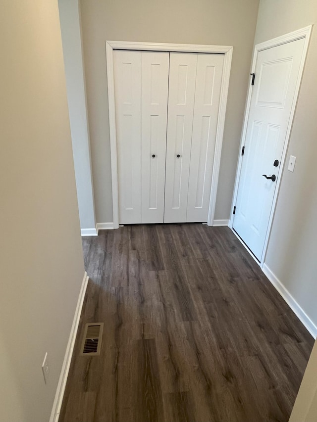 3790 Thrush St, Shakopee, MN 55379 - unfurnished bedroom with dark wood-style floors and a closet