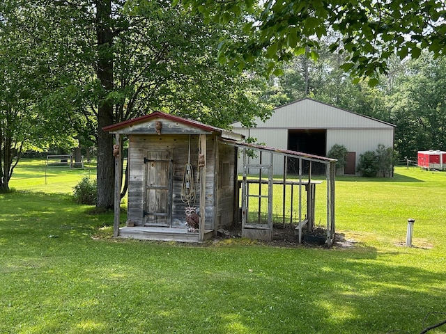 28599 Westwood Ln, Harris Twp, MN 55744 - view of pole building featuring a yard