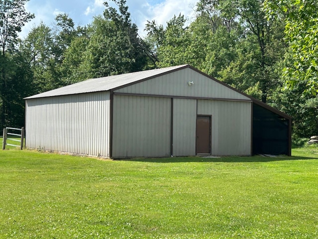 28599 Westwood Ln, Harris Twp, MN 55744 - view of pole building with a yard