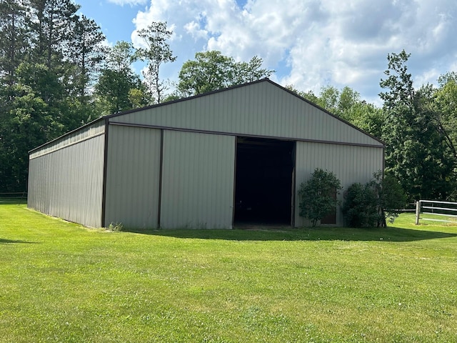 28599 Westwood Ln, Harris Twp, MN 55744 - view of pole building featuring a yard