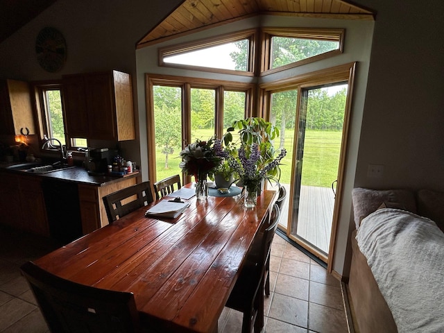 28599 Westwood Ln, Harris Twp, MN 55744 - dining area with lofted ceiling and light tile patterned floors