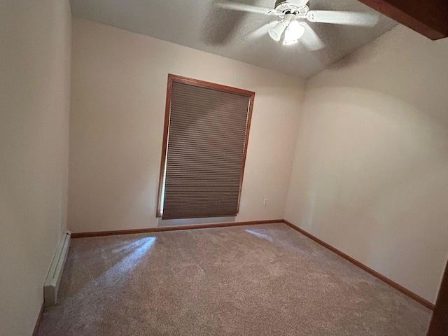28599 Westwood Ln, Harris Twp, MN 55744 - unfurnished room with carpet floors, a ceiling fan, baseboard heating, and vaulted ceiling