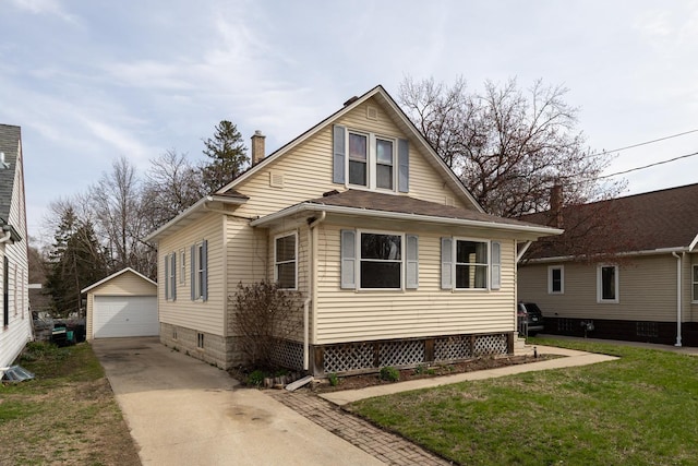 429 7th St NW, Rochester, MN 55901 - view of front of house with an outbuilding, a garage, a chimney, and a front lawn