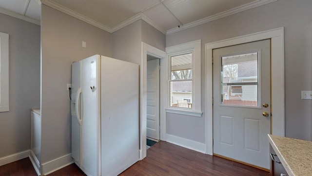 429 7th St NW, Rochester, MN 55901 - kitchen with white refrigerator with ice dispenser, dark wood finished floors, ornamental molding, and light countertops