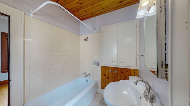 429 7th St NW, Rochester, MN 55901 - bathroom featuring bathing tub / shower combination and wooden ceiling
