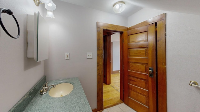 429 7th St NW, Rochester, MN 55901 - bathroom with tile patterned flooring and vanity