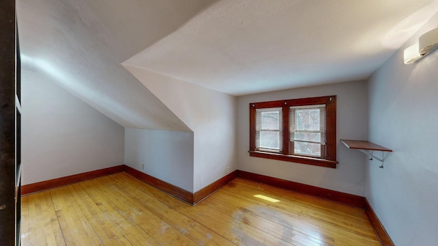 429 7th St NW, Rochester, MN 55901 - additional living space featuring light wood finished floors and lofted ceiling