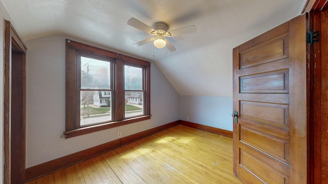 429 7th St NW, Rochester, MN 55901 - additional living space with vaulted ceiling, light wood-style floors, and a ceiling fan