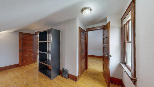 429 7th St NW, Rochester, MN 55901 - corridor featuring light wood finished floors