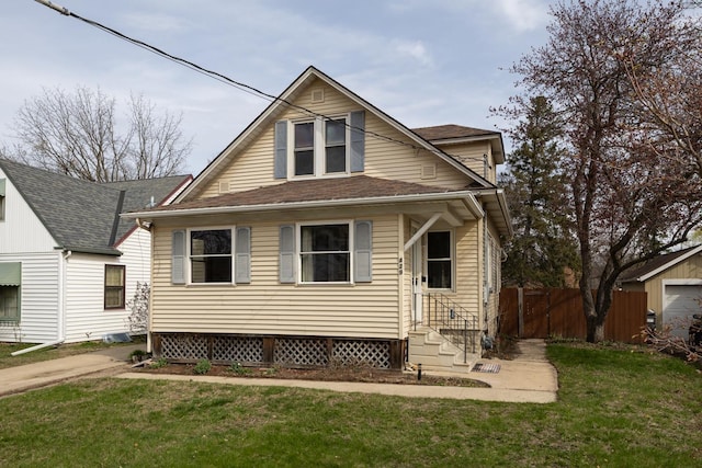429 7th St NW, Rochester, MN 55901 - view of front of home with entry steps and a shingled roof
