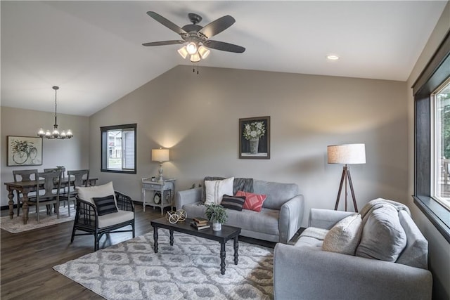 232 Chestnut St, Ellsworth, WI 54011 - living room featuring lofted ceiling, healthy amount of natural light, dark wood-style floors, and a chandelier