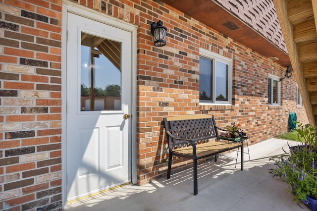 2575 Pacific Dr S Unit 301, Fargo, ND 58103 - doorway to property with brick siding