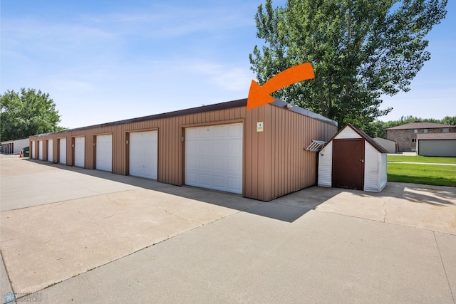 2575 Pacific Dr S Unit 301, Fargo, ND 58103 - garage featuring a storage unit