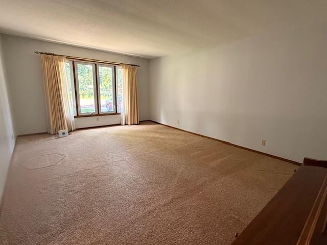 2411 Douglas St, Windom, MN 56101 - spare room with light colored carpet