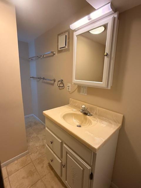 2411 Douglas St, Windom, MN 56101 - bathroom with vanity and tile patterned flooring