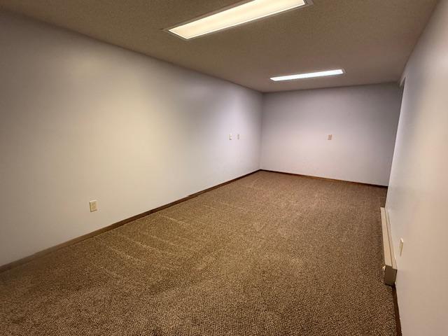 2411 Douglas St, Windom, MN 56101 - unfurnished room featuring carpet flooring