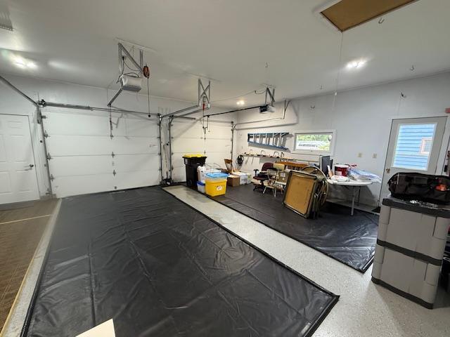 2411 Douglas St, Windom, MN 56101 - garage with a garage door opener